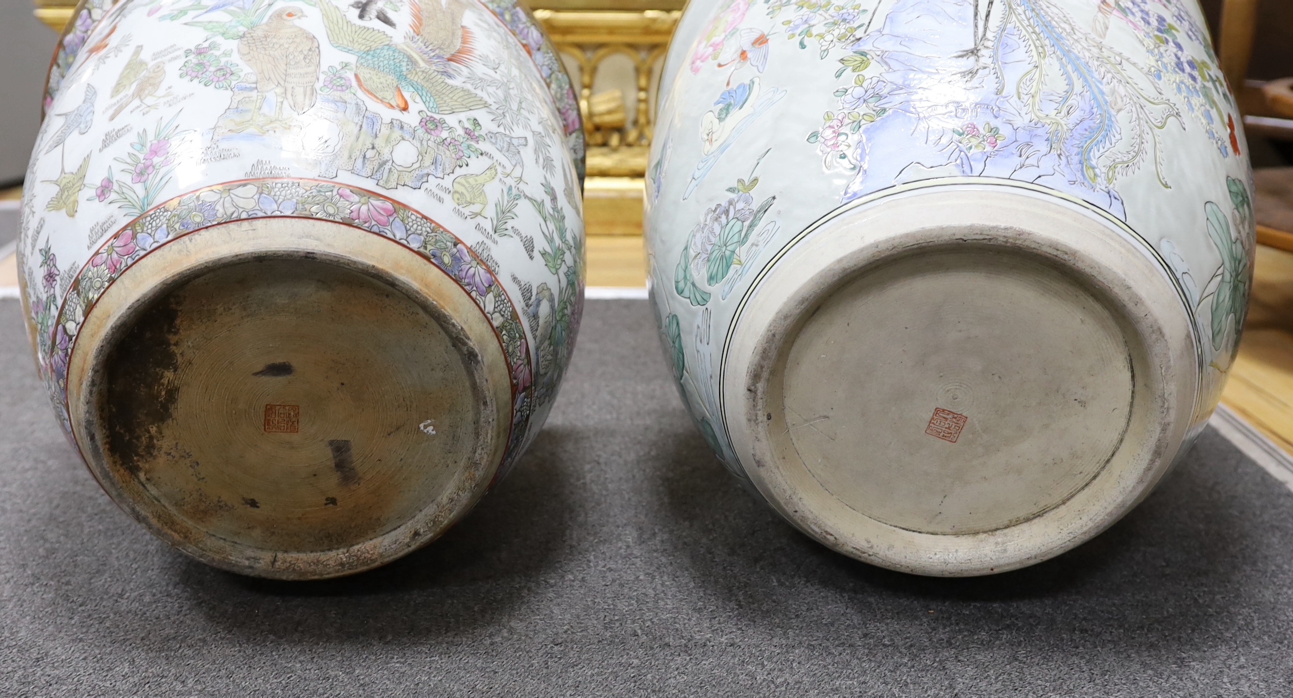 Two Chinese enamelled porcelain fish bowls, decorated with phoenixes and other birds, largest 42cm in diameter